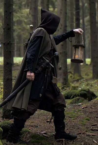 Rangers dressed in the Ranger garments from Burgschneider, is exploring the forest.