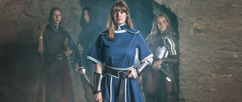 Cleric in a dark blue garb and a large mace. Official Dungeon & Dragon cleric costumes.