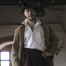 Musketeer clothing with hat, shirt and coat, from 17th century.