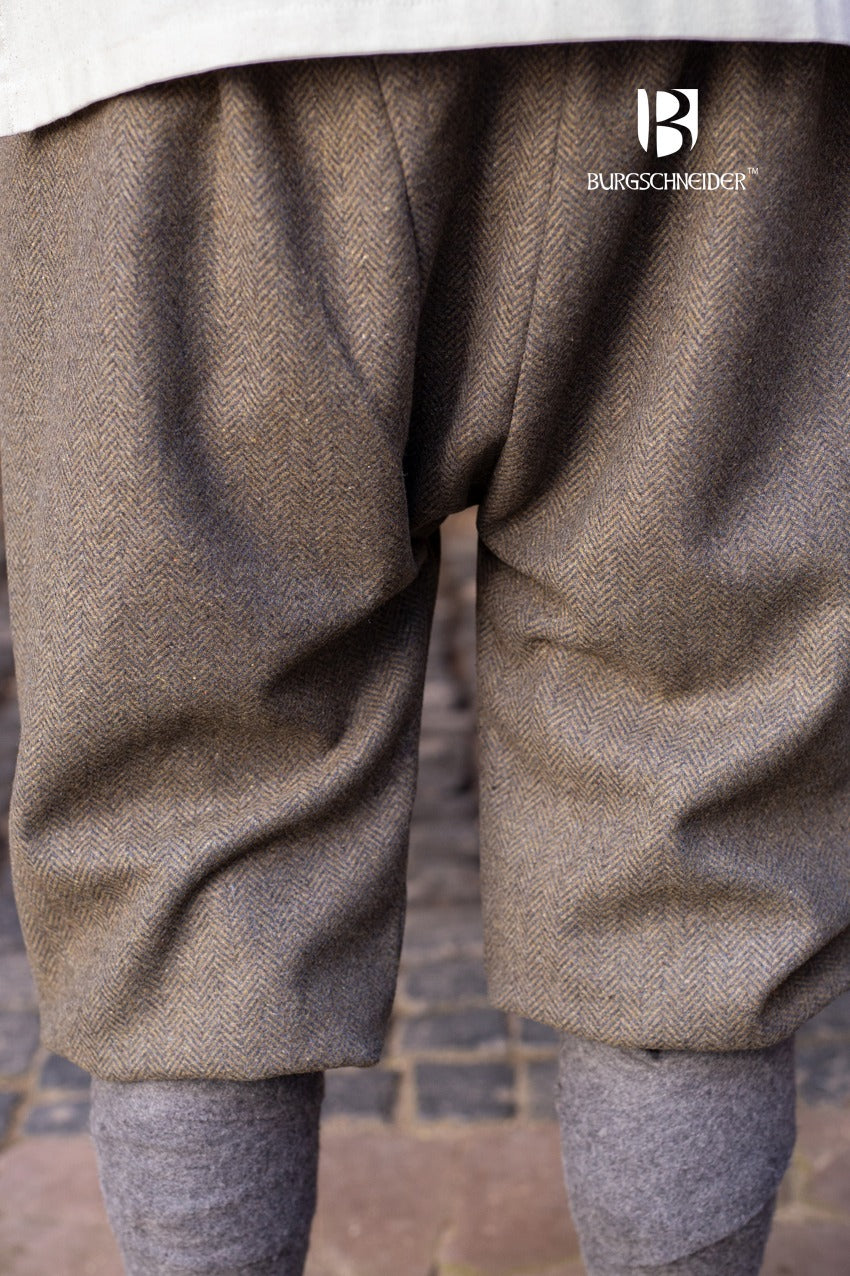 Rus Pants Tilda Herringbone Olive/Grey translates to \"Pantalones Rus Tilda Espiga Verde/Gris\" in Spanish.